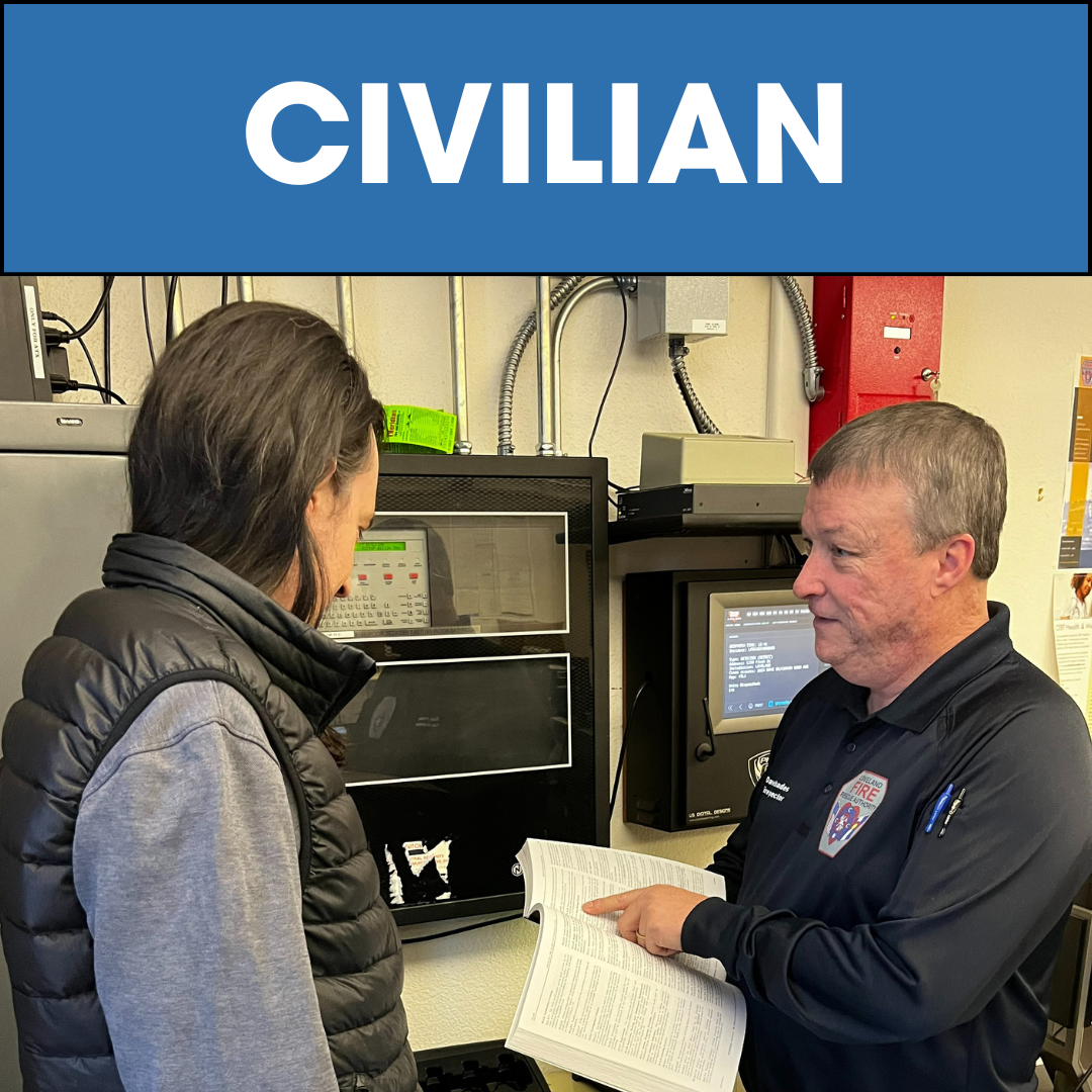 Image of fire inspector talking to man with text \"civilian\"